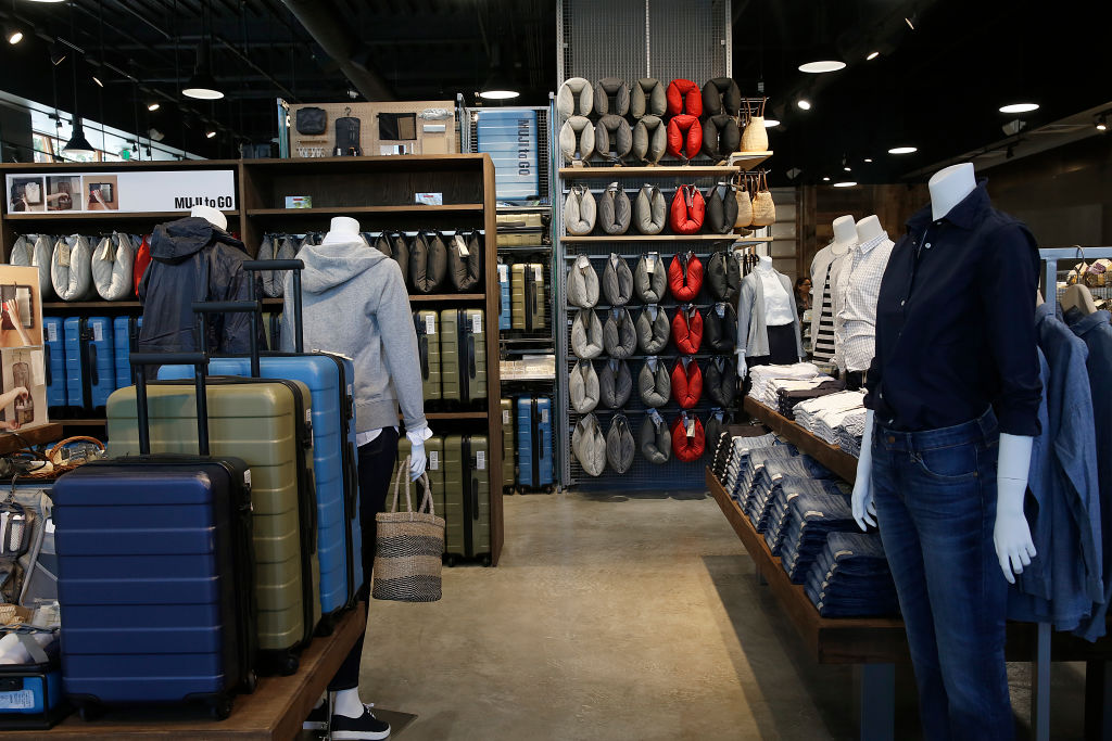 The view of the new Muji store at the Stanford shopping center in Palo Alto, Calif., with some of the limited edition colors of the hard-carry suitcases displayed at left on Friday, August 14, 2015. (Photo By Liz Hafalia/The San Francisco Chronicle via Getty Images)